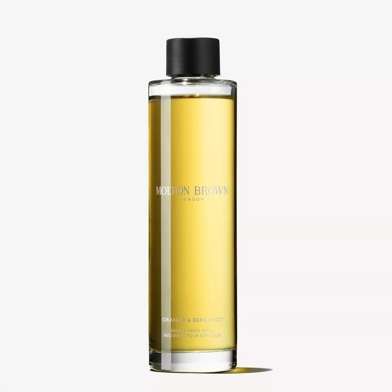A tall, cylindrical bottle of MoltonBrown Cyprus fragrance oil labeled Sample 3 serves as an ideal citrus home fragrance. The clear glass showcases a pale yellow liquid beneath a black cap, featuring a minimalist design set against a light gray background. Perfect for an Aroma Reeds Refill.