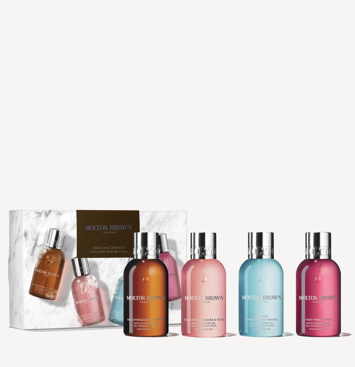 A set of MoltonBrown Cyprus Woody & Floral Body Care Collection, showcasing five unique fragrances in an array of colors, elegantly arranged in front of a partially opened white and brown gift box. Ideal for enhancing your travel bathing experience.