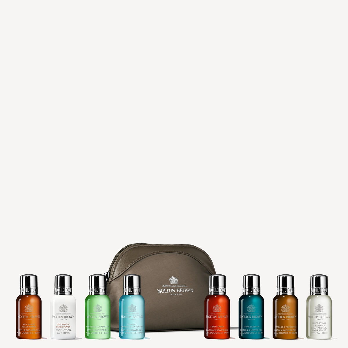 Introducing the MoltonBrown Cyprus Classic Explorer Body & Hair Mini Travel Bag, featuring nine Bath Body and Hair Care miniatures in vibrant shades. These exquisite products are elegantly presented alongside a stylish green toiletry bag, providing a reusable travel companion that elevates your daily rituals.