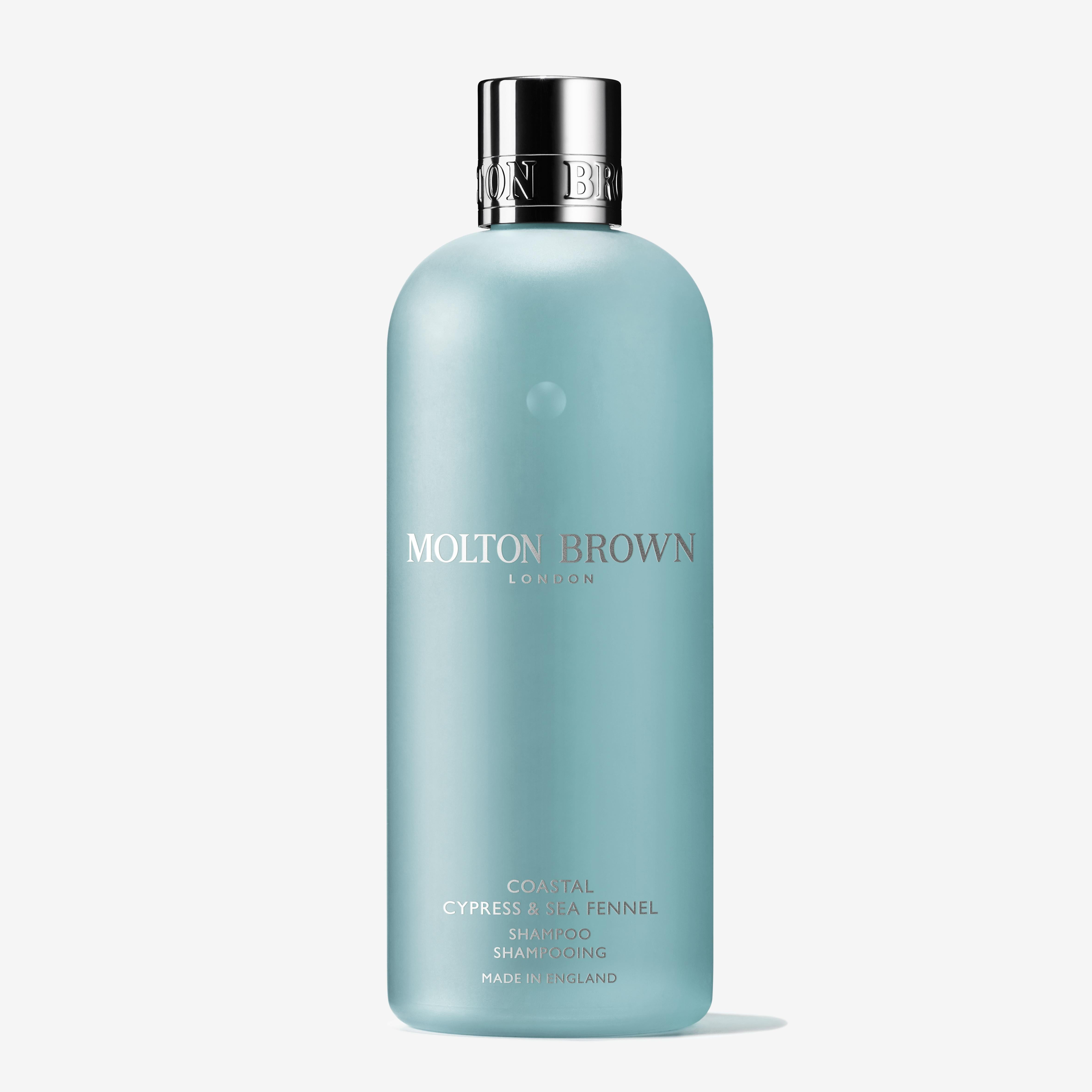 A light blue 300ml bottle of MoltonBrown Cyprus Coastal Cypress & Sea Fennel Shampoo features marine notes, a chrome cap, and minimalist white front text.