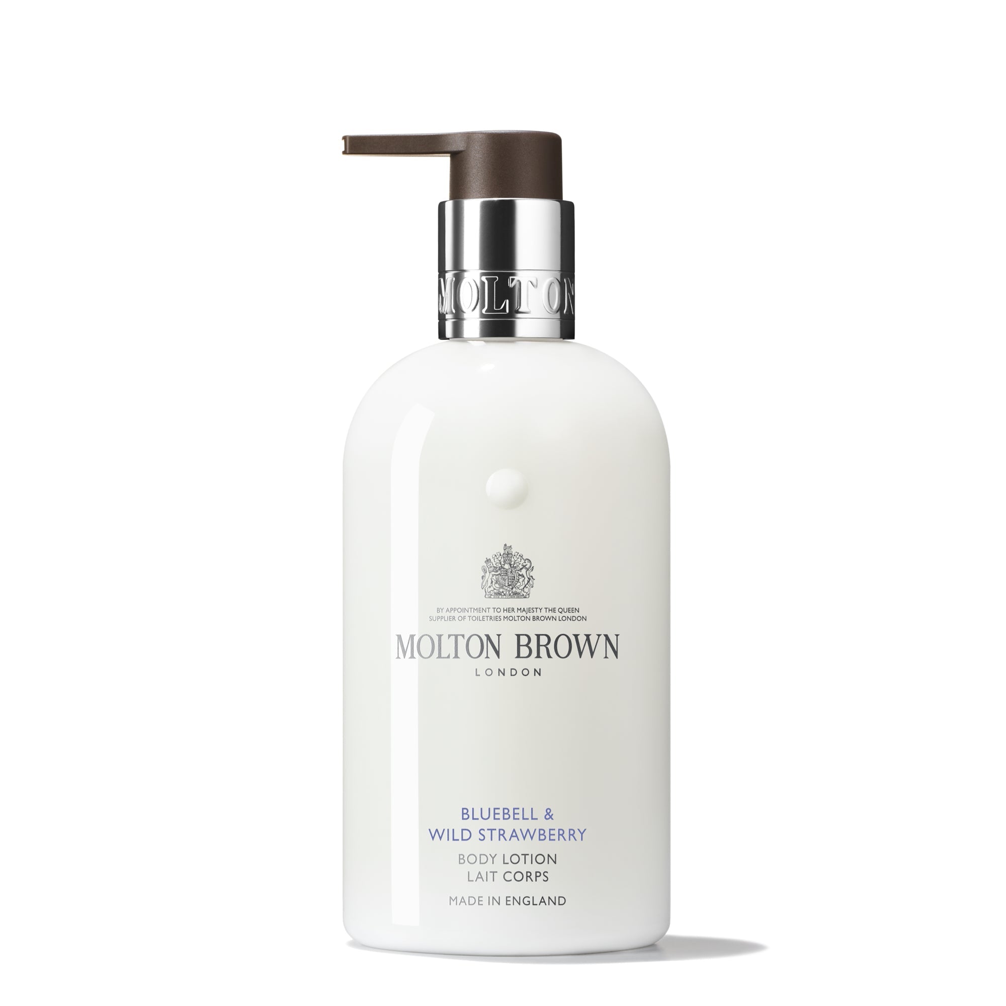 A white bottle of Bluebell & Wild Strawberry Body Lotion by MoltonBrown Cyprus, featuring a brown pump dispenser, exudes a floral-fruity scent. The brand logo and product details shimmer in silver and purple against the white background.