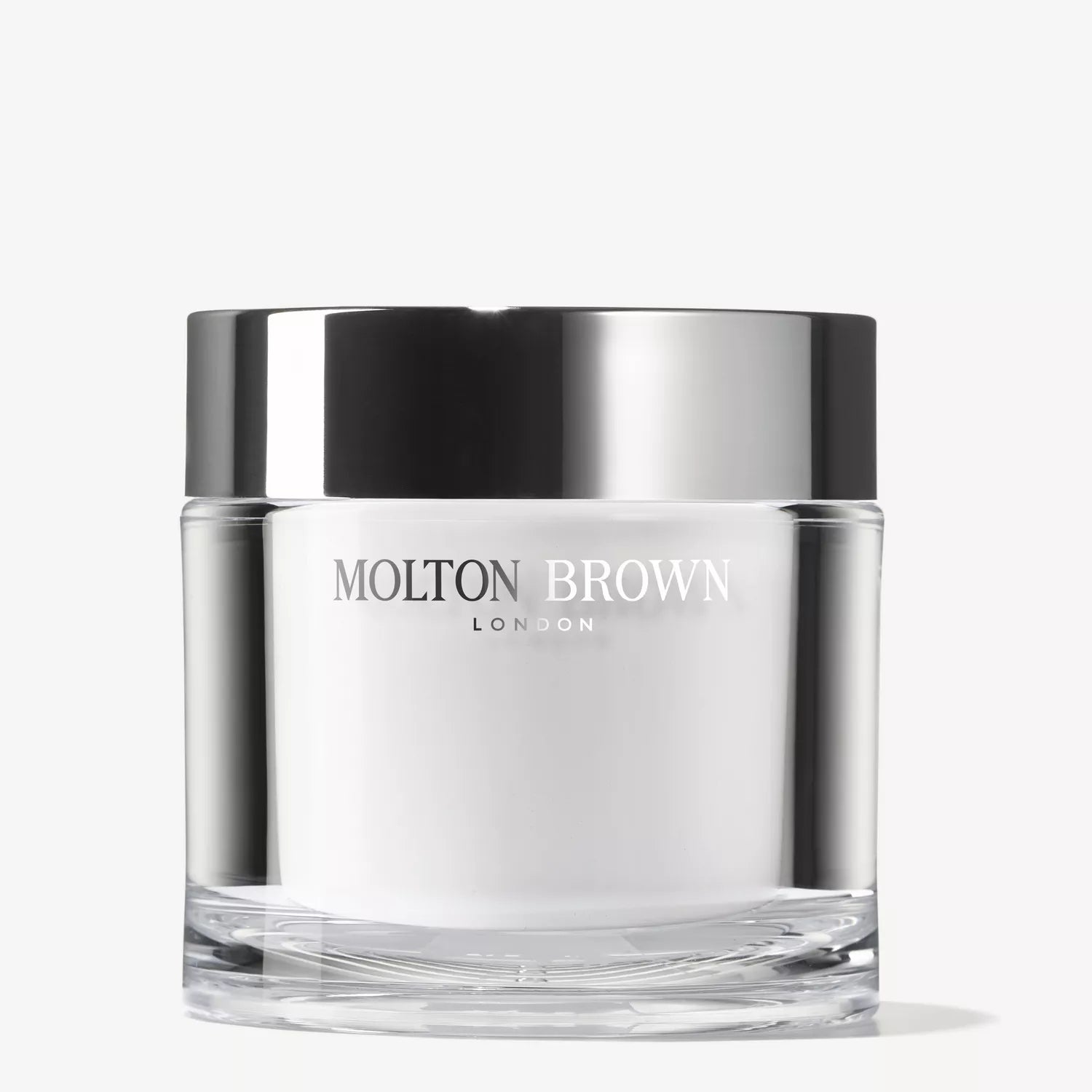 A clear glass jar with a shiny silver lid, labeled MoltonBrown Cyprus, containing Fiery Pink Pepper Refillable Body Cream 200g, is set against a plain white background.