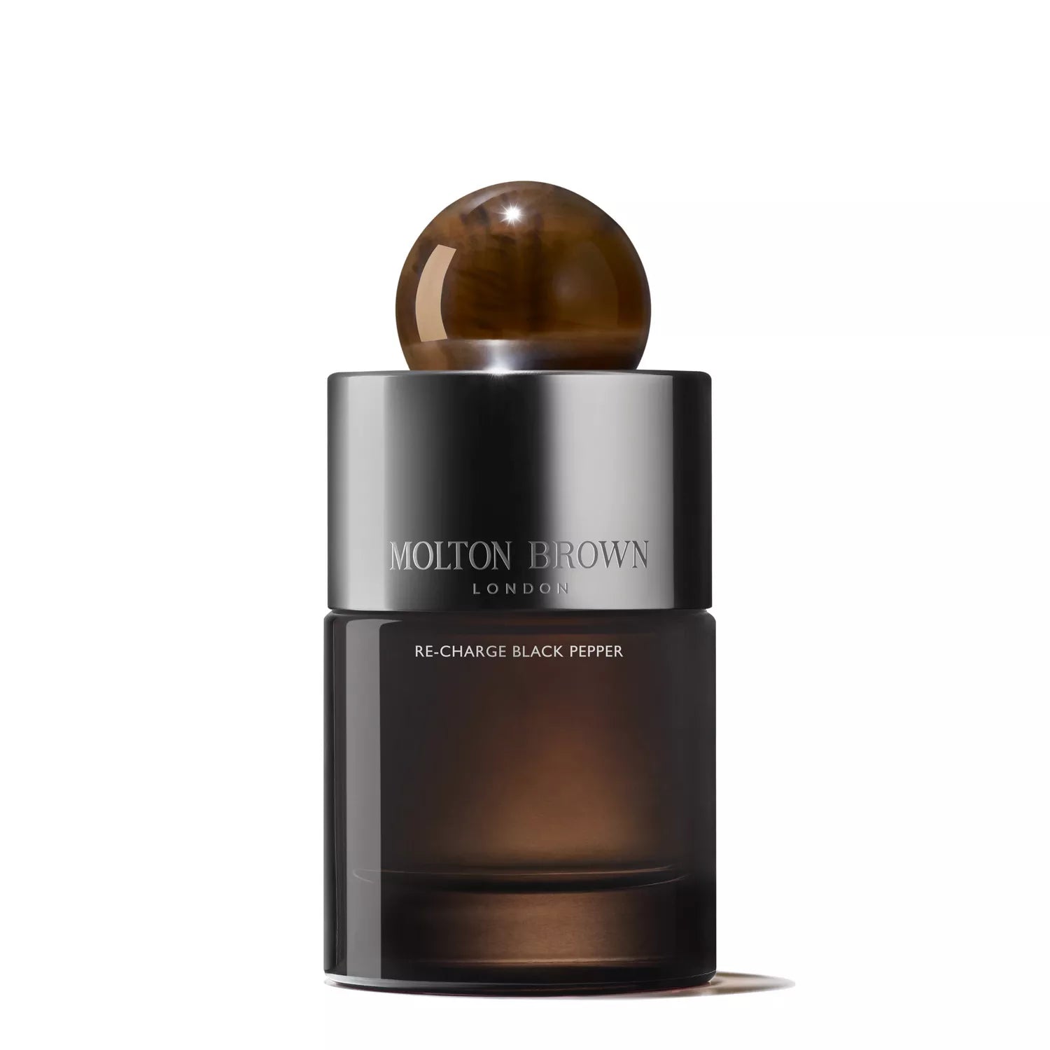 A sleek, dark glass bottle from the MoltonBrown Cyprus Re-charge Black Pepper Fragrance Gift Set, featuring a shiny metallic label and a round brown cap, displayed against a plain white background.